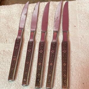 Set of 5 National stainless steel table knives.